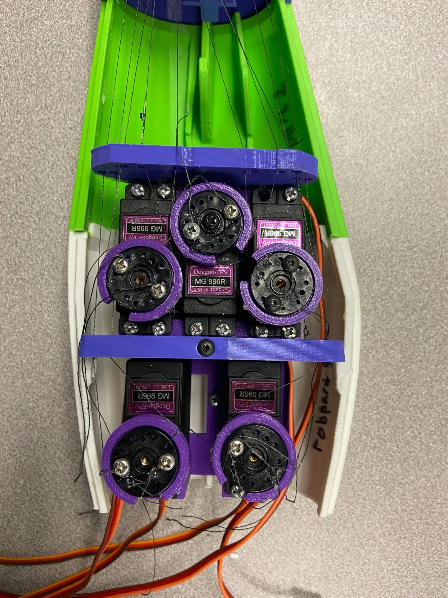 Servo motors mounted on the arm