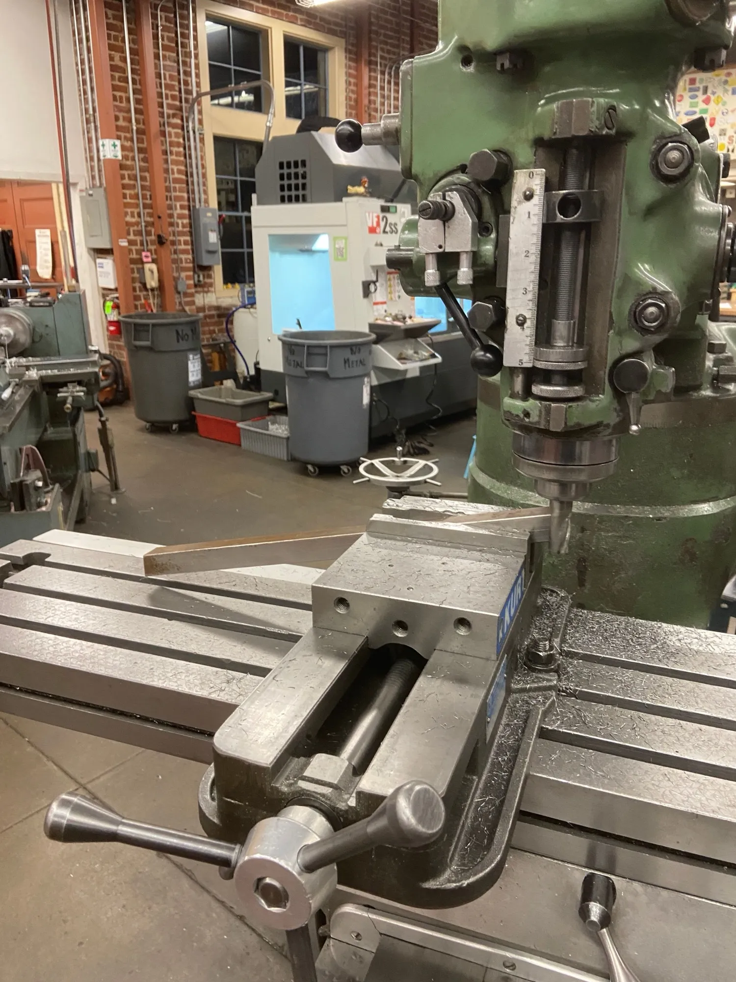 Milling a table leg end held in angle blocks