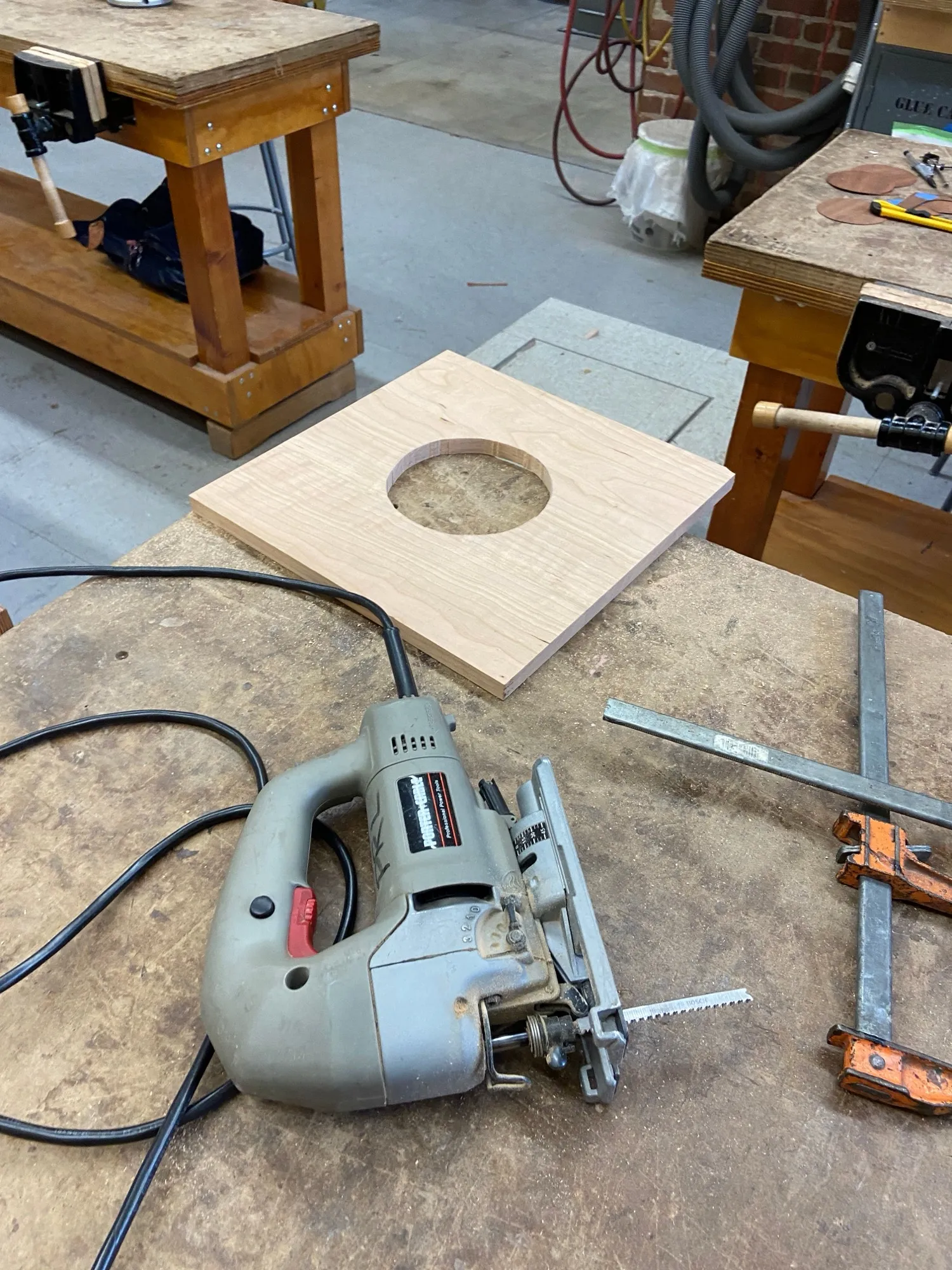 Cutting the center hole in the table top